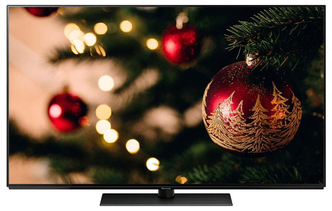 TV screen displaying decorated Christmas tree