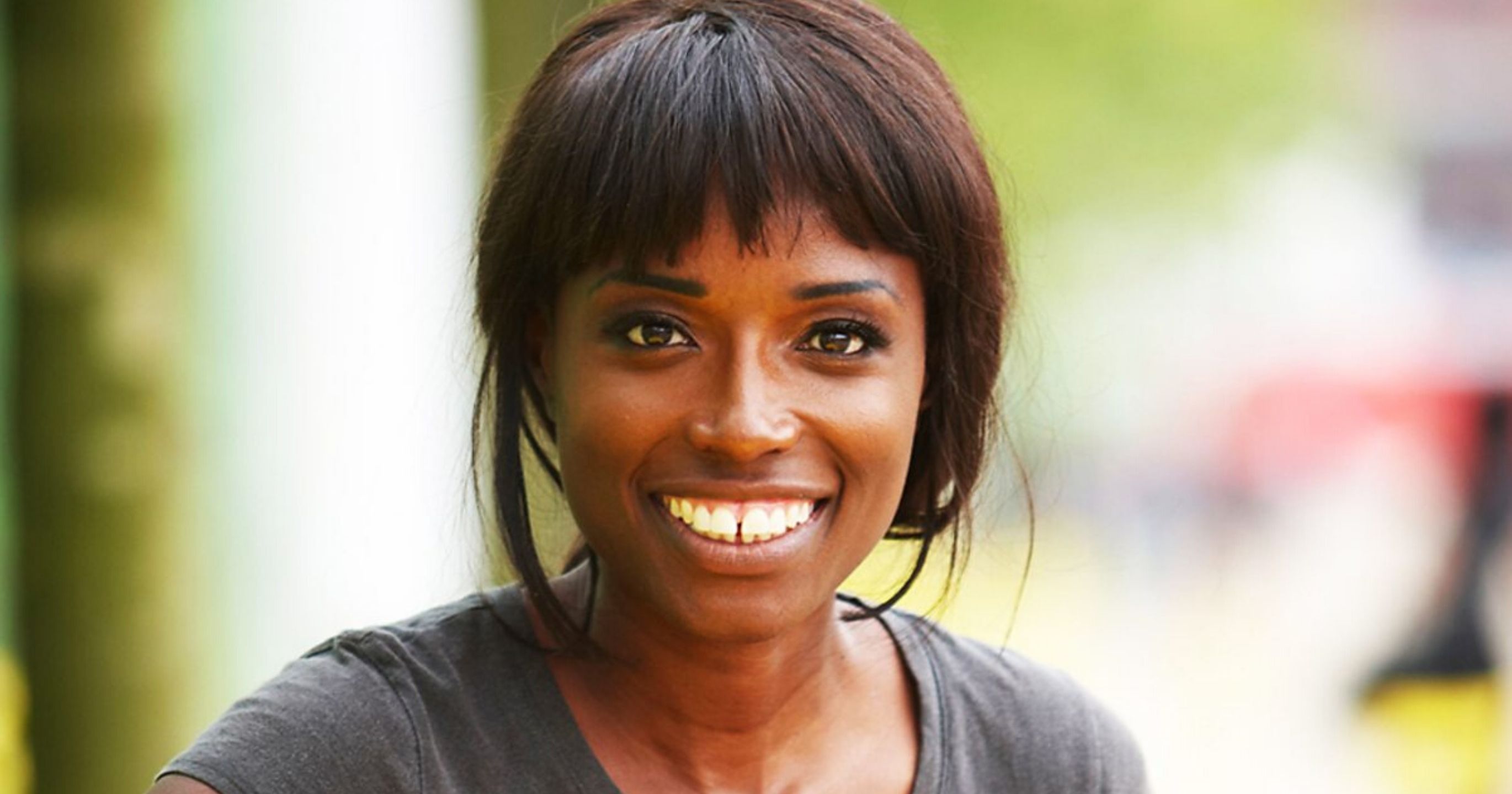 Lorraine Pascale smiles at the camera with a blurred background