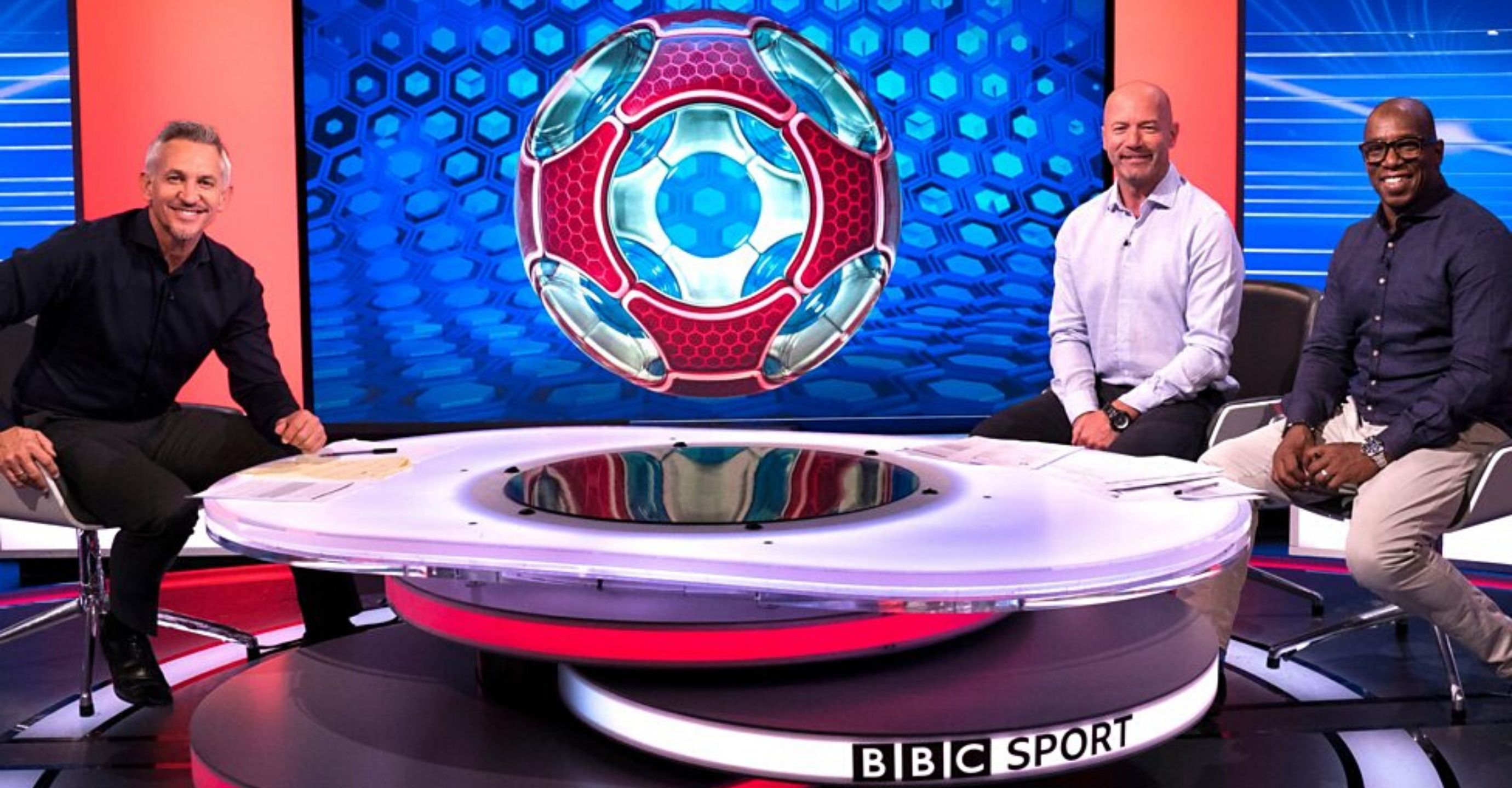 Gary Lineker and co-presenters sit round Match of the Day's table