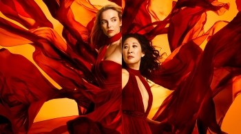Jodie Comer and Sandra Oh as Villanelle and Eve, both in red dresses looking in opposite directions