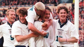 Players on the England squad celebrating at Euro '96