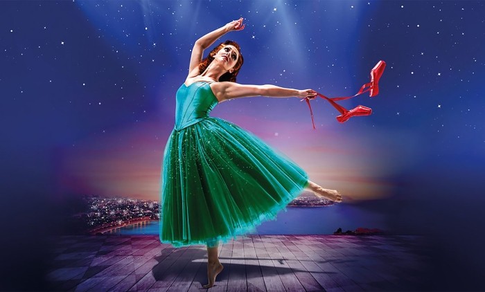 Ballerina dancing with red ballet shoes