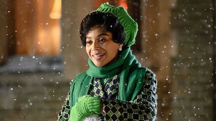 Lucille wrapped up in the snow outside Nonatus House