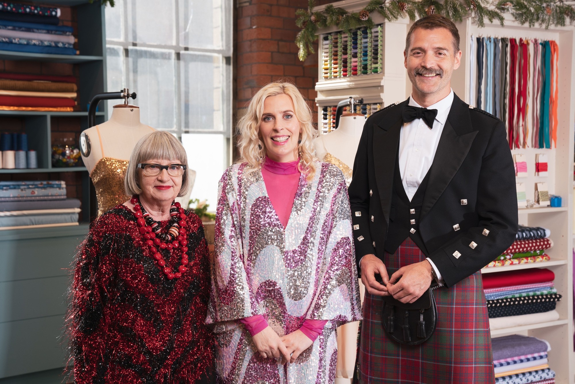 Sara Pascoe and Sewing Bee judges dressed formally for the New Year