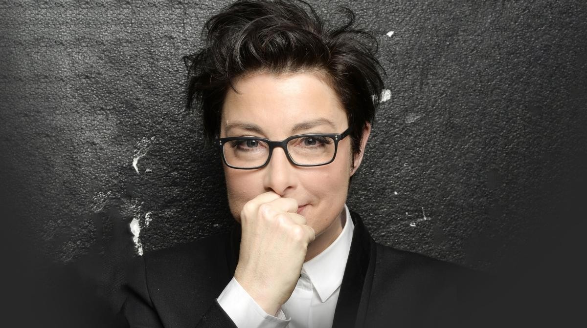 Sue Perkins against a black background