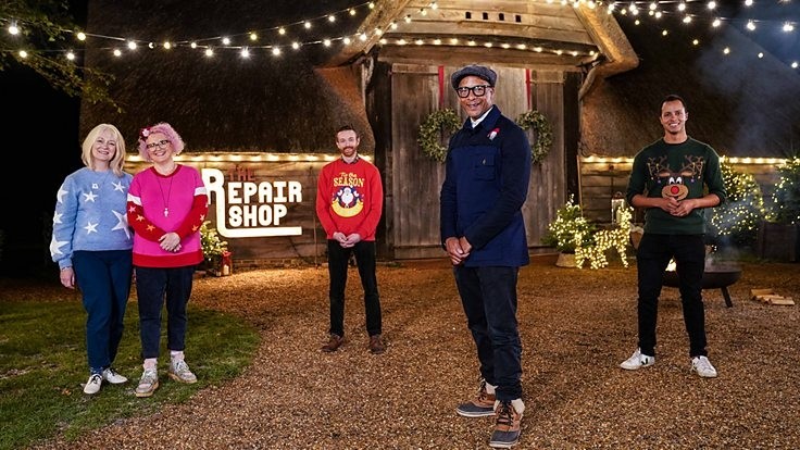 The Repair Shop team in Christmas jumpers outside their workshop